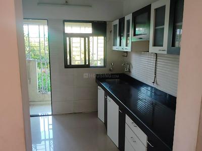 Kitchen Image of 970 Sq.ft 2 BHK Apartment / Flat for rent in Cosmos Jewels, Thane West Thane for Rs. 35000