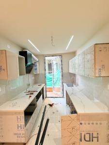 Kitchen Image of 1000 Sq.ft 3 BHK Builder Floor for sale in Rajpur Khurd Extension New Delhi for Rs. 6500000