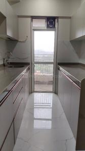 Kitchen Image of 1450 Sq.ft 3 BHK Apartment / Flat for rent in JP North Barcelona Wing D, Mira Road East Mira Bhayandar for Rs. 56000
