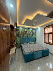 Bedroom Image of 650 Sq.ft 2 BHK Builder Floor for rent in Dwarka Mor New Delhi for Rs. 25000