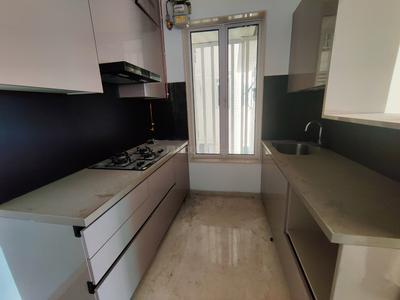Kitchen Image of 950 Sq.ft 2 BHK Apartment / Flat for sale in Aurum Q Residences R3, Ghansoli Navi Mumbai for Rs. 22500000