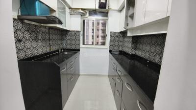 Kitchen Image of 630 Sq.ft 1 BHK Apartment / Flat for sale in Lodha Amara, Kolshet Thane for Rs. 7500000