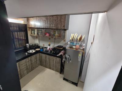 Kitchen Image of 550 Sq.ft 1 BHK Apartment / Flat for sale in Sai Chitra Apartment, Kandivali West Mumbai for Rs. 10000000