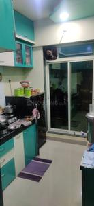 Kitchen Image of 650 Sq.ft 1 BHK Apartment / Flat for sale in Kabir Enclave, Titwala Thane for Rs. 3340000