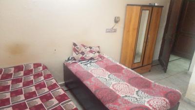 Bedroom Image of Sharma ji Pg in Sector 20, Noida