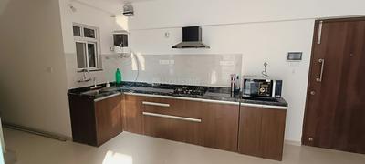 Kitchen Image of 1250 Sq.ft 3 BHK Duplex for rent in Gera World Of Joy, Upper Kharadi Pune for Rs. 62000