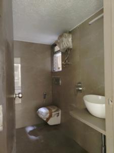 Common Bathroom Image of 800 Sq.ft 2 BHK Apartment / Flat for sale in Mansarovar Pearl Gardens, Vasai West Vasai for Rs. 6400000