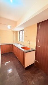 Kitchen Image of 625 Sq.ft 1 BHK Apartment / Flat for rent in Domlur Layout Bengaluru for Rs. 33500