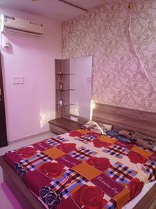 Bedroom Image of 1300 Sq.ft 2 BHK Duplex for rent in Navnirman Shubhlaxmi Residency, Dindoli Surat for Rs. 20000