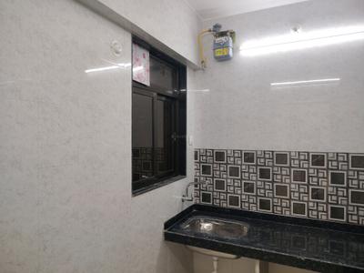 Kitchen Image of 700 Sq.ft 1 BHK Apartment / Flat for rent in Raunak Delight, Kasarvadavali Thane for Rs. 16135