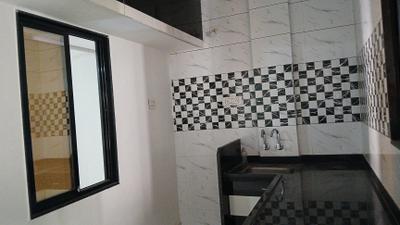 Kitchen Image of 700 Sq.ft 1 BHK Builder Floor for rent in Dahin Nagar Surat for Rs. 11500