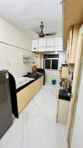 Kitchen Image of 780 Sq.ft 2 BHK Apartment / Flat for rent in Gayatri Darshan, Kandivali East Mumbai for Rs. 56000