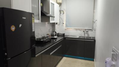 Kitchen Image of 1200 Sq.ft 4 BHK Builder Floor for rent in DLF The Grove, DLF Phase 5 Gurgaon for Rs. 135000