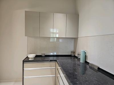 Kitchen Image of 910 Sq.ft 2 BHK Apartment / Flat for sale in Nivasa Ananya Phase I, Lohegaon Pune for Rs. 6500000