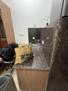 Kitchen Image of 350 Sq.ft 1 RK Builder Floor for rent in Varun Enclave, Sector 28 Noida for Rs. 15097