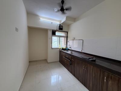 Kitchen Image of 600 Sq.ft 1 BHK Apartment / Flat for rent in Kasarvadavali Thane for Rs. 17000