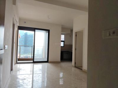 Living Room Image of 1015 Sq.ft 2 BHK Apartment / Flat for sale in Ambuja Ecospace Residencia, New Town Kolkata for Rs. 12200000