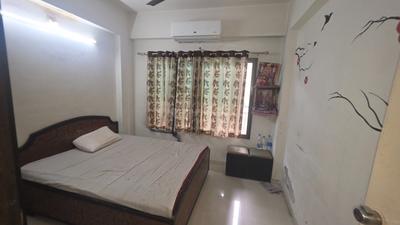 Bedroom Image of 1150 Sq.ft 2 BHK Apartment / Flat for sale in Shree Hari Nirmit Flora, Sanand Ahmedabad for Rs. 3500000