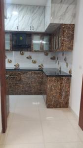 Kitchen Image of 1100 Sq.ft 2 BHK Apartment / Flat for rent in Brigade Cornerstone Utopia, Varthur Bengaluru for Rs. 50000