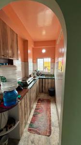 Kitchen Image of 1009 Sq.ft 2 BHK Apartment / Flat for sale in Baguiati Kolkata for Rs. 4000000