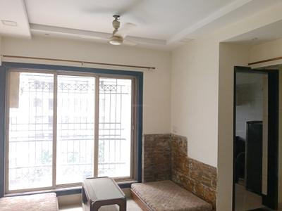 Living Room Image of 500 Sq.ft 1 BHK Apartment / Flat for rent in Abrol Krishna Green Land Park, Kasarvadavali Thane for Rs. 18000