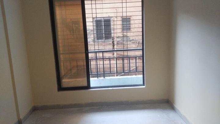 Rajshree Apartment Bedroom 1