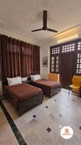Bedroom Image of Zora Stays in Roop Nagar, New Delhi