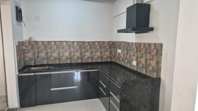 Kitchen Image of 1101 Sq.ft 3 BHK Apartment / Flat for sale in Abhinav Pebbles Urbania, Bavdhan Pune for Rs. 12700000