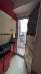 Kitchen Image of 1100 Sq.ft 3 BHK Apartment / Flat for sale in Aditya City Apartment Ghaziabad, Wave City Ghaziabad for Rs. 7700000