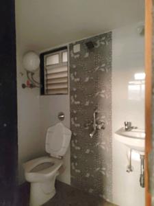 Common Bathroom Image of 566 Sq.ft 1 BHK Apartment / Flat for sale in Thakur Galaxy, Boisar Mumbai for Rs. 2400000