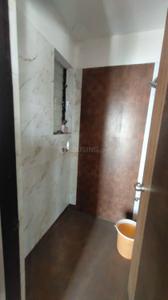 Bathroom Image of 710 Sq.ft 1 BHK Apartment / Flat for sale in Tharwani Vedant Millenia Happiness, Titwala Thane for Rs. 2600000