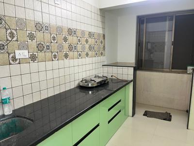 Kitchen Image of 980 Sq.ft 2 BHK Apartment / Flat for rent in Indira Nagar Nashik for Rs. 18500