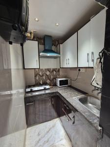 Kitchen Image of 450 Sq.ft 1 RK Builder Floor for rent in Ramesh Nagar New Delhi for Rs. 17000