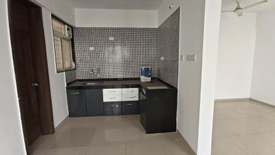 Kitchen Image of 780 Sq.ft 1 BHK Apartment / Flat for sale in Gagan Micasaa, Wagholi Pune for Rs. 3800000
