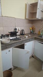 Kitchen Image of 450 Sq.ft 1 RK Builder Floor for rent in Safdarjung Enclave New Delhi for Rs. 32000