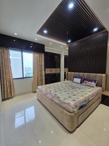 Bedroom Image of 960 Sq.ft 3 BHK Apartment / Flat for sale in Ambuja Uddipa The Condoville, Baranagar Kolkata for Rs. 15500000