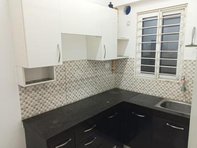 Kitchen Image of 600 Sq.ft 2 BHK Apartment / Flat for rent in Urbanrise Revolution One, Padur Chennai for Rs. 23000