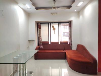 Living Room Image of 880 Sq.ft 2 BHK Apartment / Flat for sale in Atul Blue Empire, Kandivali West Mumbai for Rs. 16000000