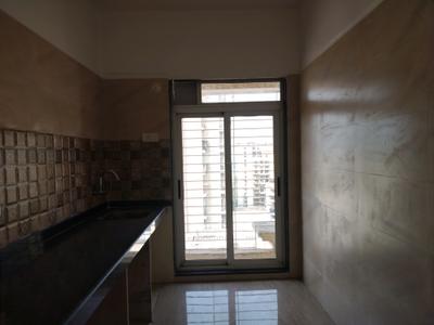 Kitchen Image of 700 Sq.ft 1 BHK Apartment / Flat for sale in Mangalam, Kharghar Navi Mumbai for Rs. 4500000