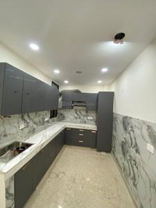 Kitchen Image of 950 Sq.ft 2 BHK Builder Floor for rent in Ramesh Nagar New Delhi for Rs. 48000