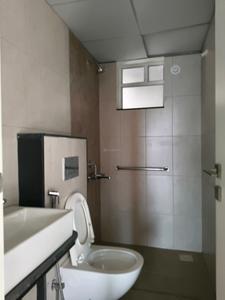 Common Bathroom One Image of 862 Sq.ft 2 BHK Apartment / Flat for sale in Godrej Hillside 1, Mahalunge Pune for Rs. 7500000