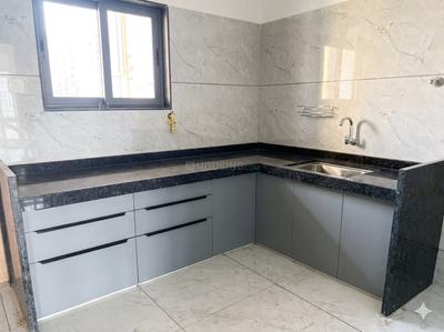 Kitchen Image of 1250 Sq.ft 2 BHK Apartment / Flat for rent in Sai Aangan, Palanpur Surat for Rs. 25000