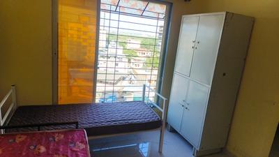Bedroom Image of Swami Samarth PG in Thane West, Thane