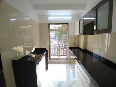 Kitchen Image of 850 Sq.ft 2 BHK Apartment / Flat for sale in RNA NG Bliss, Bhayandar East Mira Bhayandar for Rs. 10700000