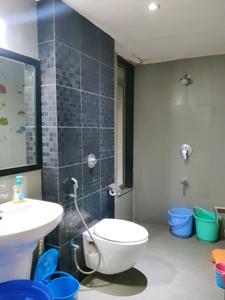 Common Bathroom Image of 950 Sq.ft 2 BHK Apartment / Flat for sale in Rustomjee La Familia Wing A, Thane West Thane for Rs. 14500000