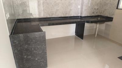 Kitchen Image of 1015 Sq.ft 2 BHK Apartment / Flat for sale in Gini Vivante, Kiwale Pune for Rs. 6700000