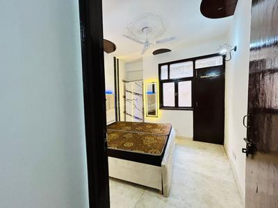 Bedroom Image of 512 Sq.ft 1 RK Builder Floor for rent in Freedom Fighters Enclave New Delhi for Rs. 8100