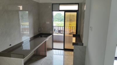 Kitchen Image of 710 Sq.ft 1 BHK Apartment / Flat for sale in Shilphata Thane for Rs. 3850000