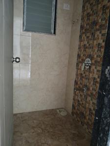 Common Bathroom Image of 668 Sq.ft 1 BHK Apartment / Flat for sale in Pushpak Nagar Navi Mumbai for Rs. 4656000