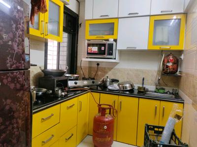 Kitchen Image of 1000 Sq.ft 2 BHK Apartment / Flat for rent in Suyog Apartment, Juinagar Navi Mumbai for Rs. 45000